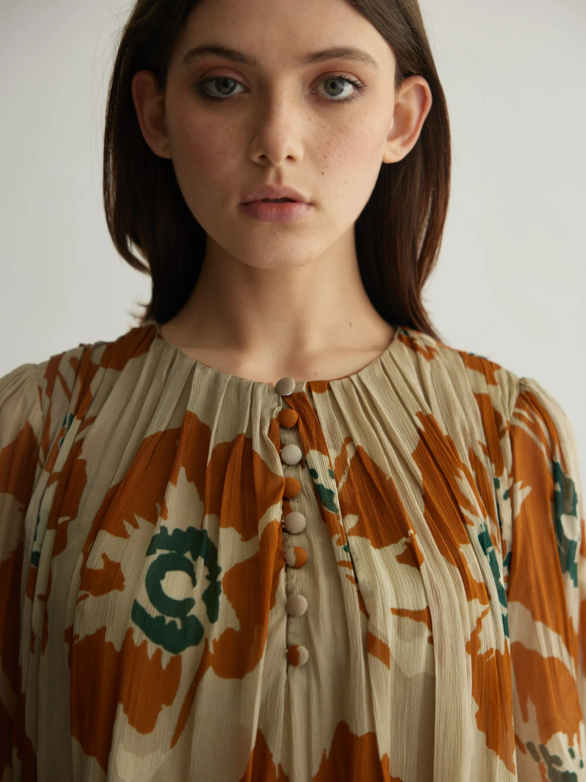 BEIGE AND RUST FLORAL PLEATED TOP