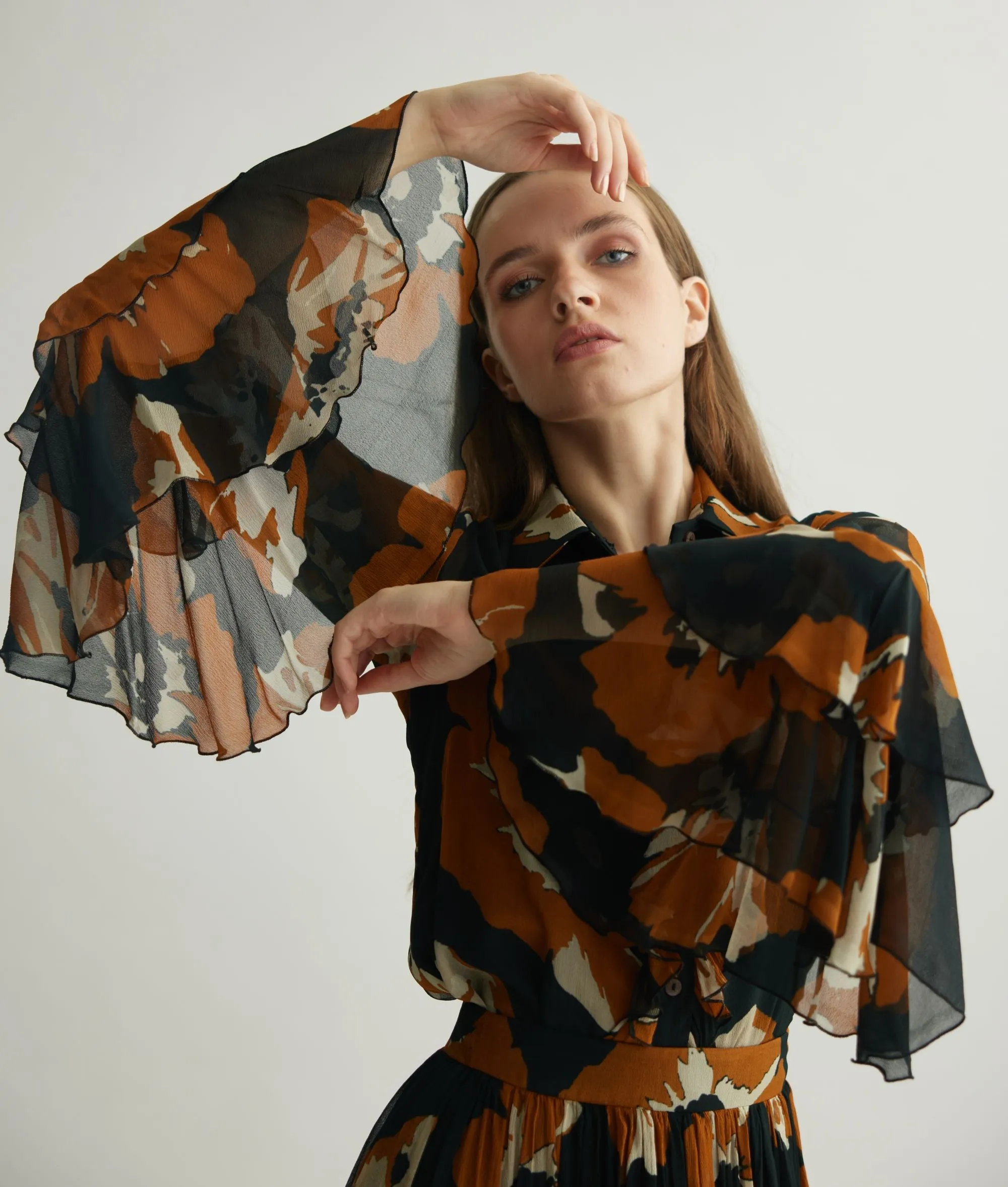 BLACK AND RUST FLORAL FRILL TOP